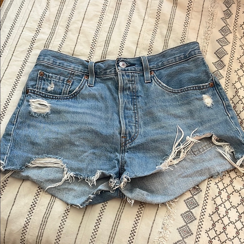Levi’s 501 button front Distressed Blue Denim Shorts size 28